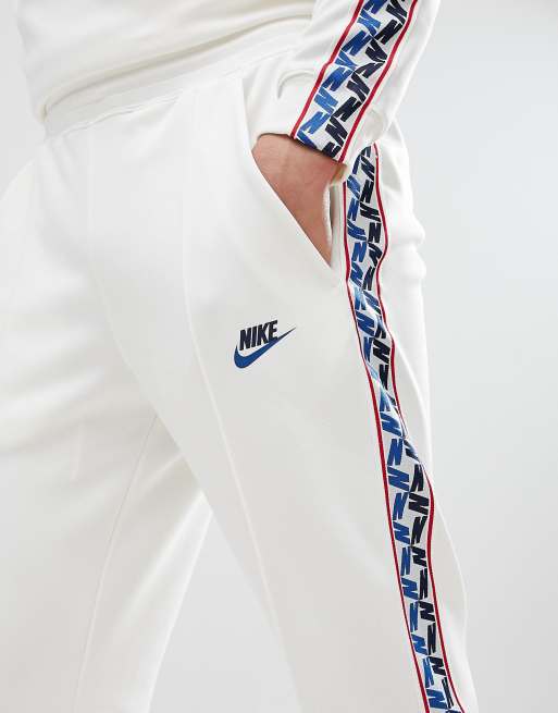 Nike track clearance pants white stripe