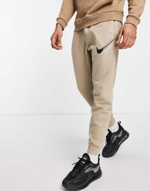 Nike trainingspak beige new arrivals