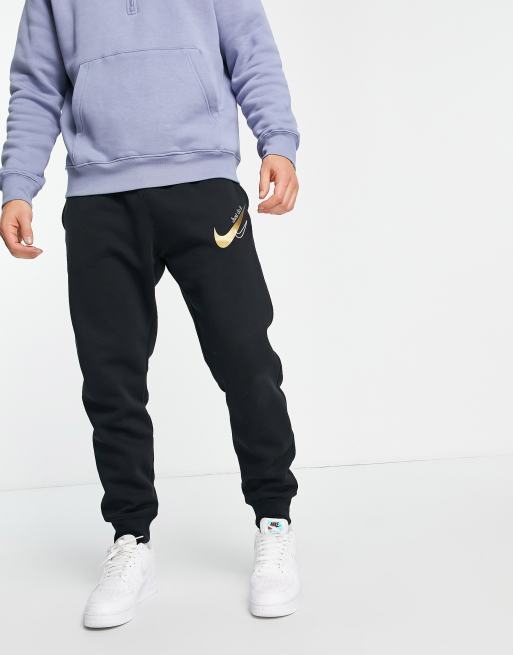 Nike - Joggingbukser med manchet-logo i sort og guld