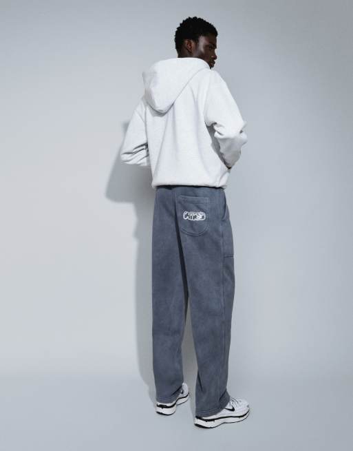 Nike joggingbukser med spraygrafik og åben kant i vasket sort, 4 af 5