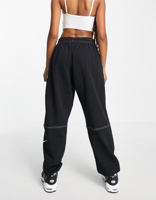 Nike – Jogginghose in Schwarz mit Fleece-Innenseite, Swoosh-Logo und Kontrastnaht, 4 von 4