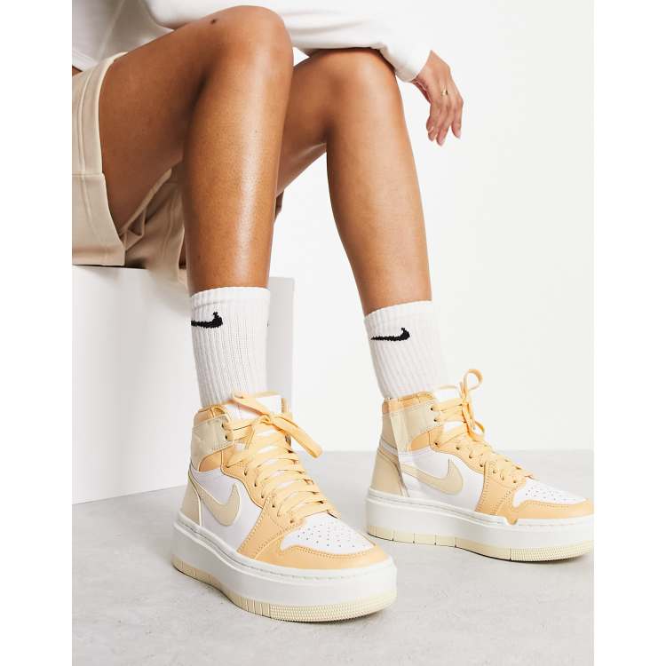 Nike Jordan 1 Elevate High sneakers in gold and white | ASOS