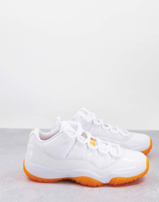 Orange and white jordan on sale 11s