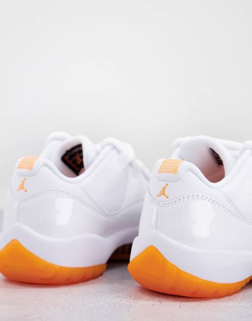 Orange and white hot sale jordan 11s