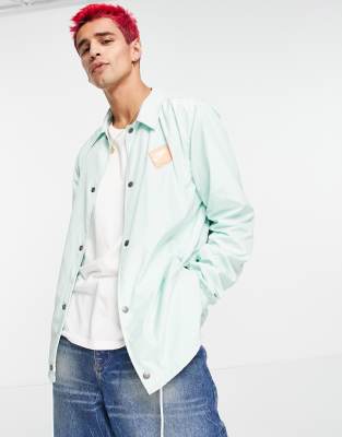 nike windrunner mint green