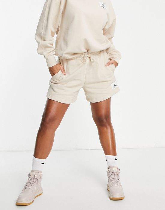 https://images.asos-media.com/products/nike-jordan-essentials-fleece-shorts-in-sand/202407755-3?$n_550w$&wid=550&fit=constrain