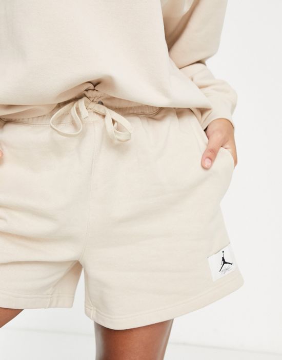 https://images.asos-media.com/products/nike-jordan-essentials-fleece-shorts-in-sand/202407755-4?$n_550w$&wid=550&fit=constrain