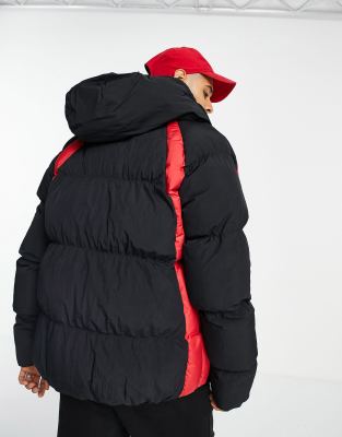 red and black puffer coat