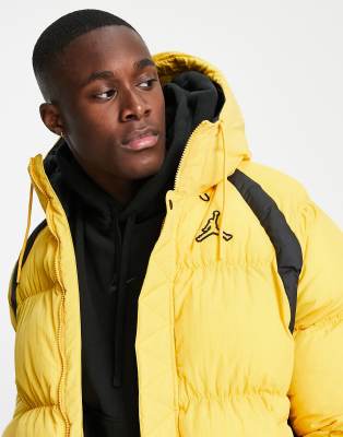 yellow long puffer jacket