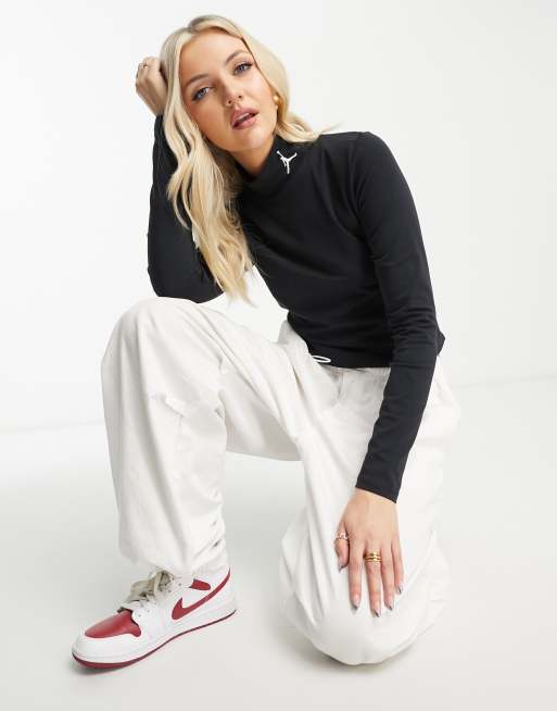 Nike animal print logo sweatpants in white