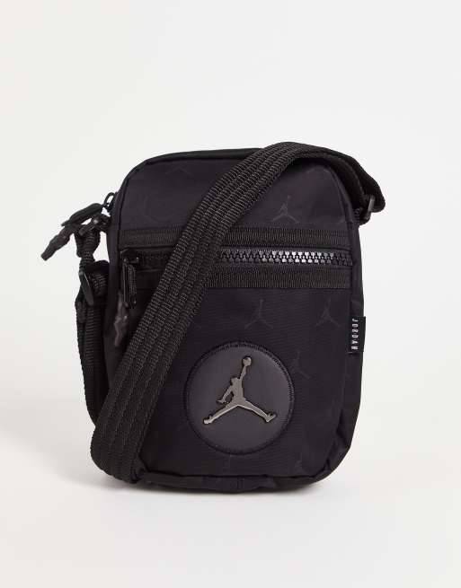 Nike Jordan Jacquard logo flight bag in black | ASOS