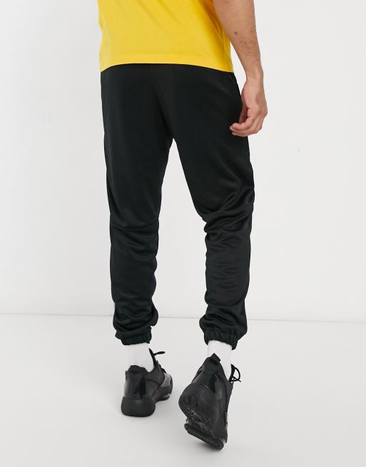 Nike Jordan Jumpman DNA polyknit cuffed joggers in black