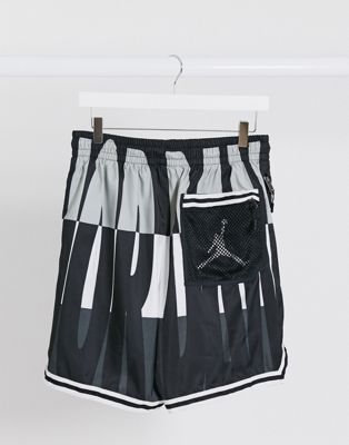 Nike Jordan logo swim shorts in black 