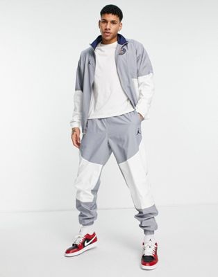 Jordan Paris Saint-Germain woven joggers in grey and white
