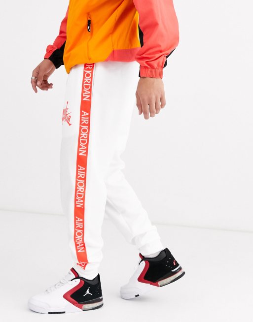 Orange and hot sale white joggers