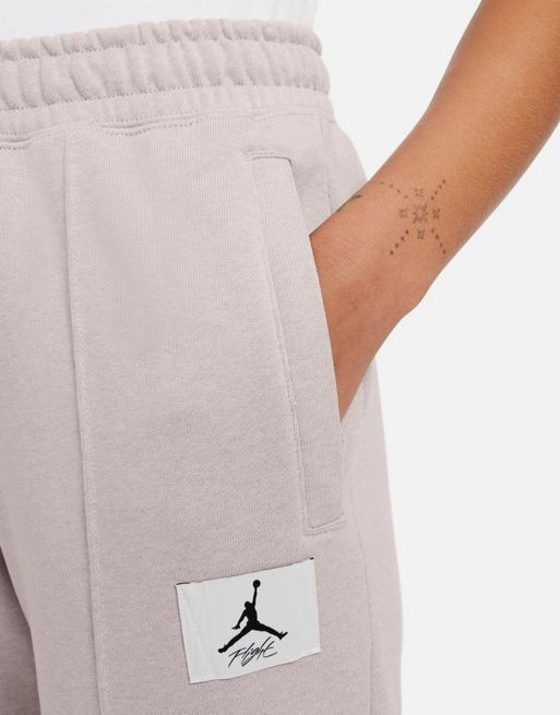 Nike Essentials cuffed sweatpants in white heather, ASOS