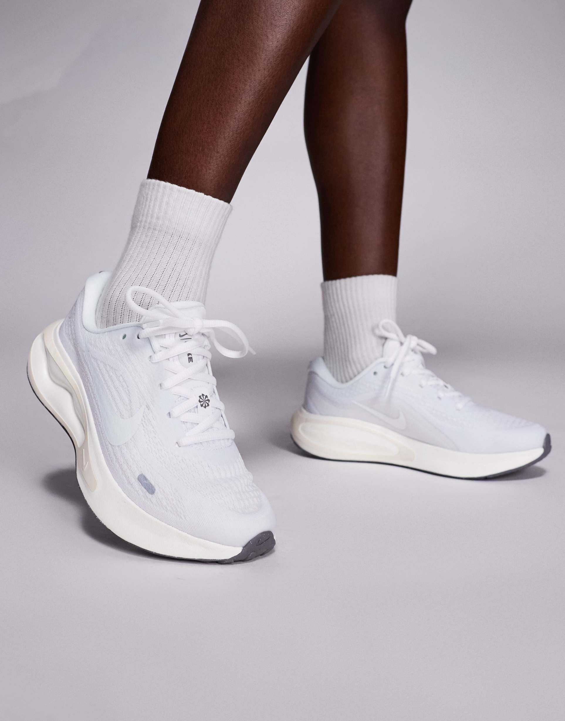 nike journey run sneakers in white