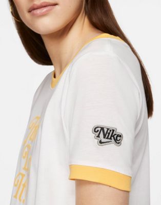 white and yellow nike t shirt