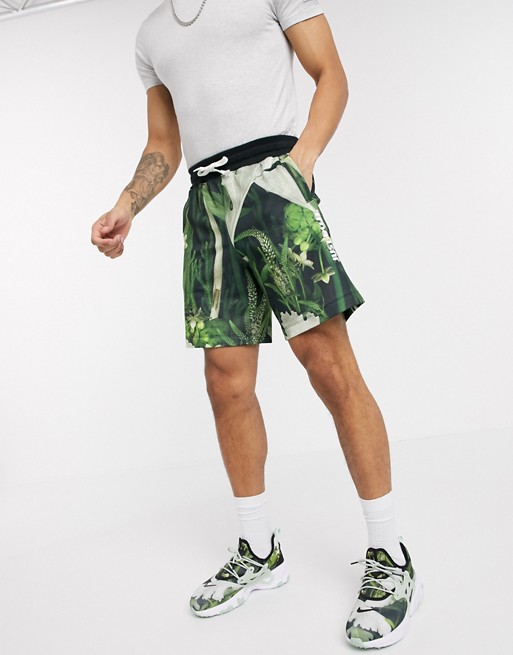 Nike Just Do It shorts in tropical leaf print