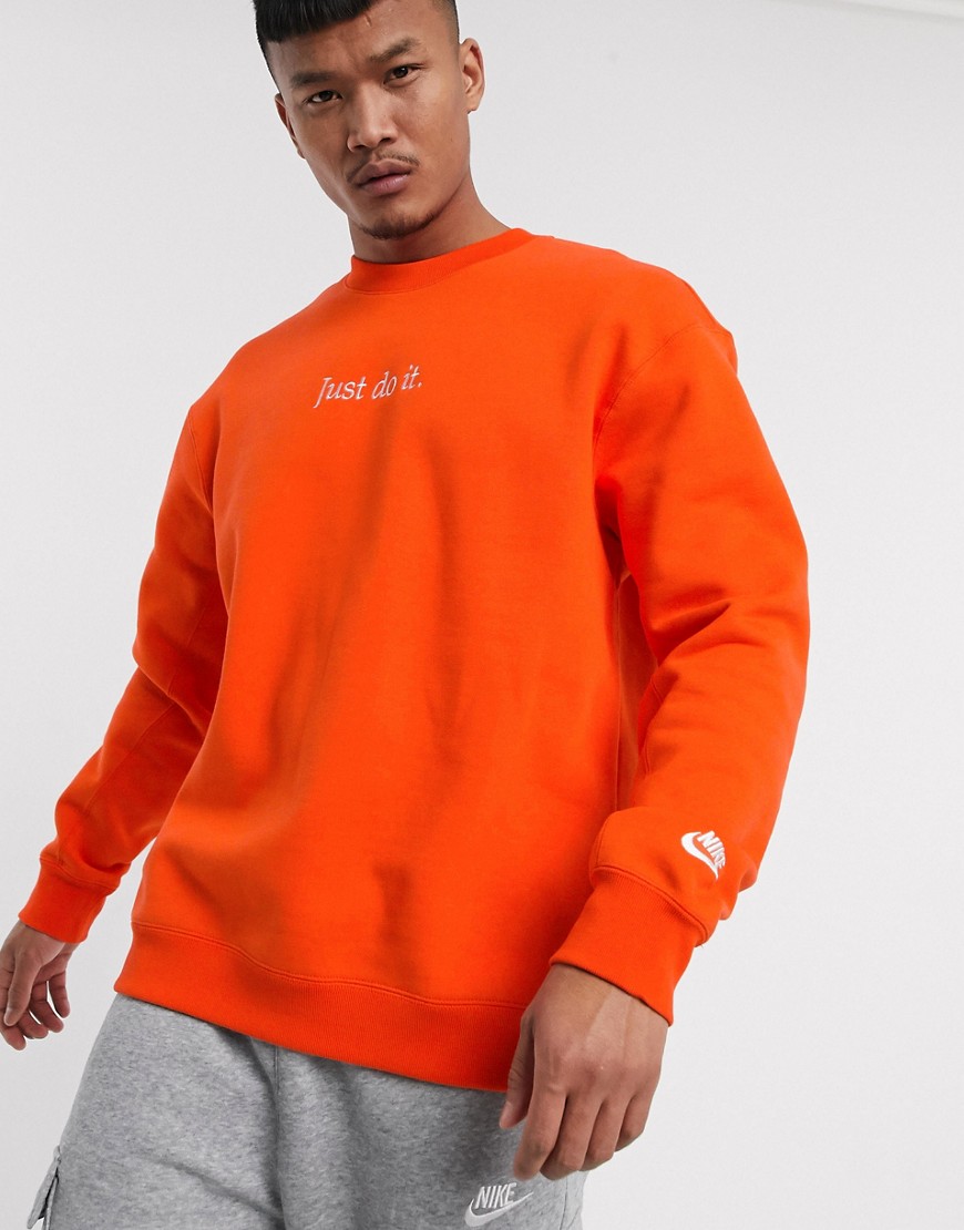 Nike - Just Do It - Sweater met ronde hals in oranje