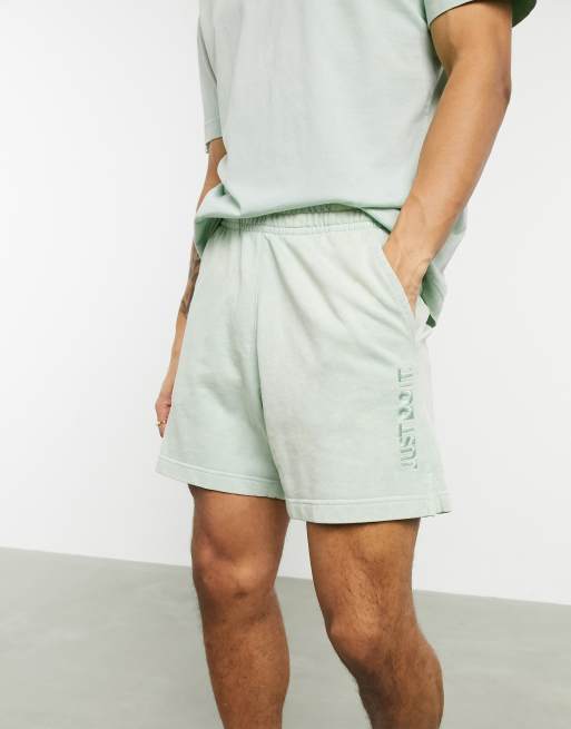 Nike Just Do It washed shorts in green