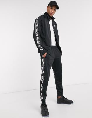 taped nike tracksuit