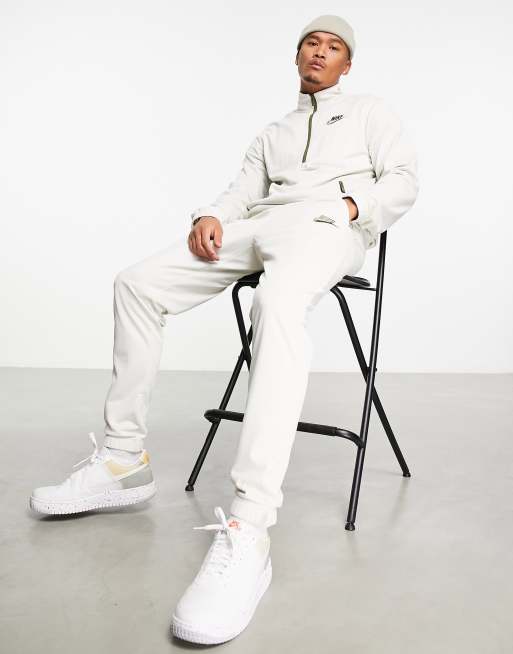 Nike knit 1 4 zip tracksuit set in off white ASOS