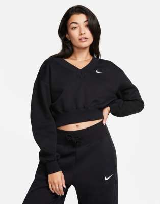 Nike - Kurz geschnittenes Sweatshirt in Schwarz mit V-Ausschnitt und kleinem Swoosh-Logo