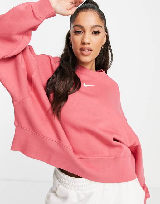 Nike Kurzes Oversize Sweatshirt in Archaeo Rosa mit kleinem Swoosh Logo ASOS