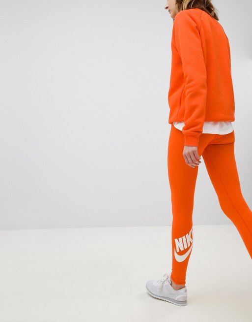 Nike Legasee Logo Leggings In Orange | ASOS