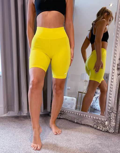 Nike legging shorts in yellow ASOS