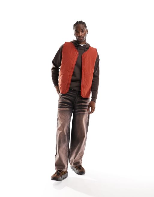 Nike Life quilted gilet in orange | ASOS