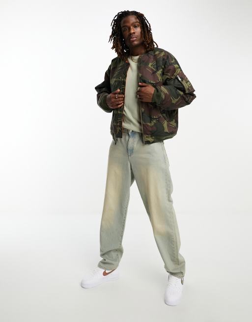 Nike woven camo pants hotsell