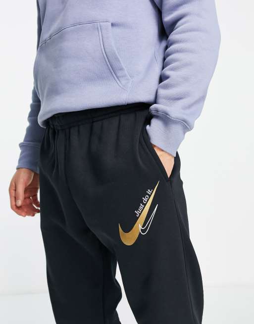 Black and shop gold nike sweats