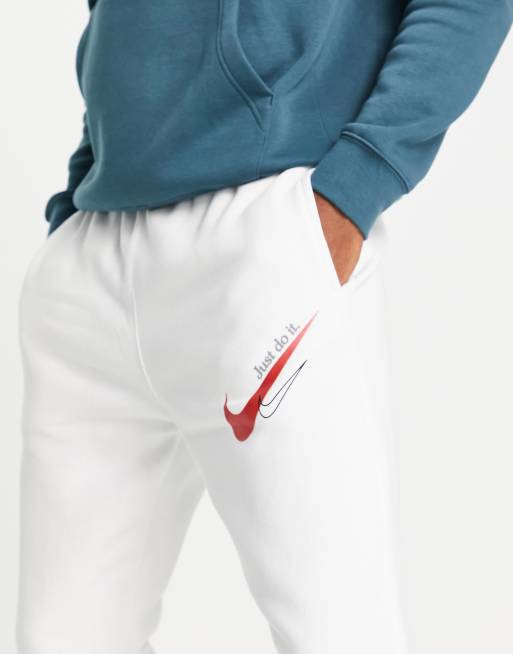 Jogging nike best sale deux logo