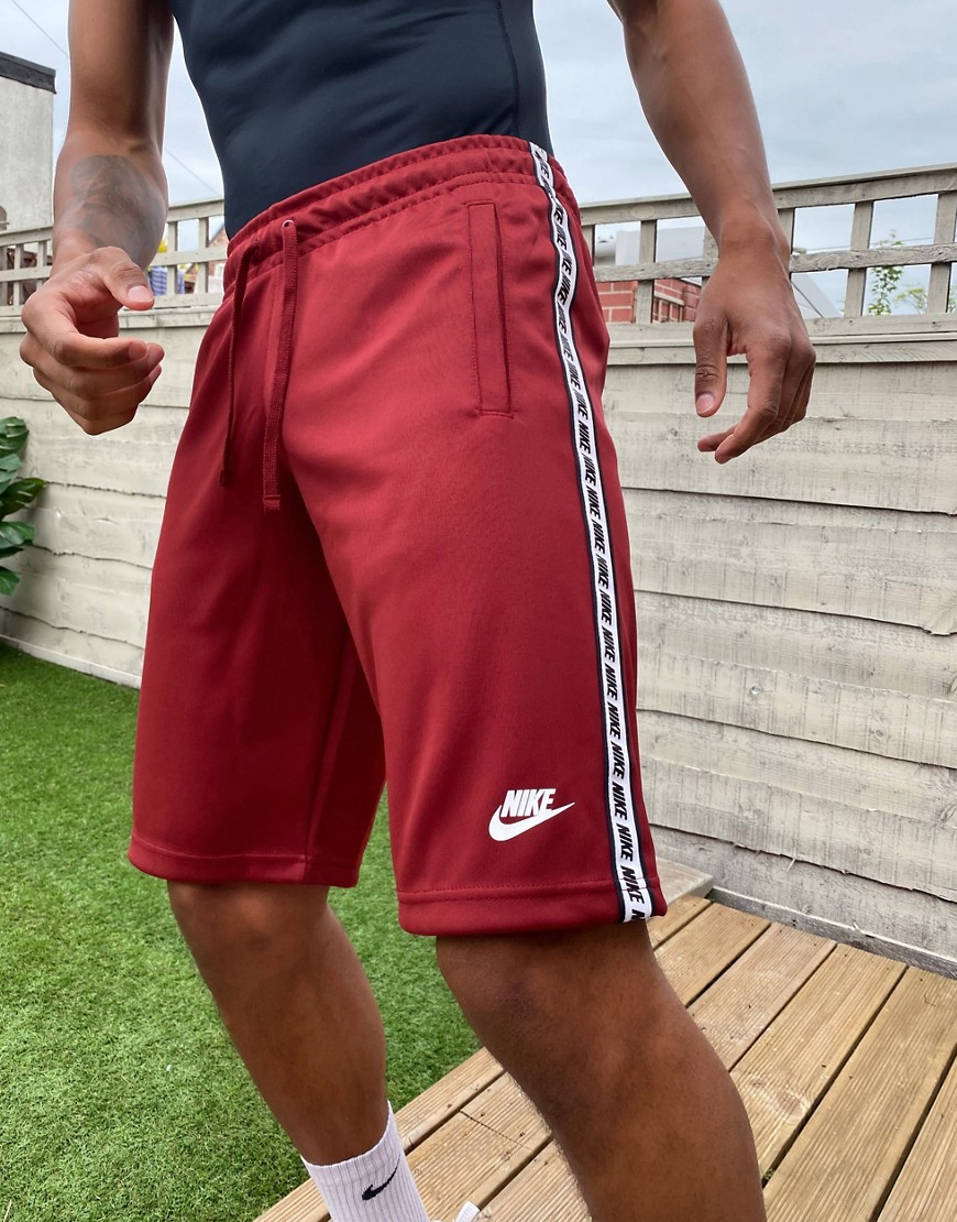 Nike logo taping polyknit shorts in burgundy-Red