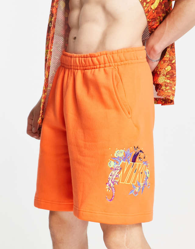 Nike Logo Twist glow in the dark logo shorts in orange