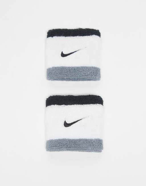 Nike - Lot de 2 bracelets en éponge classiques à logo virgule - Multicolore