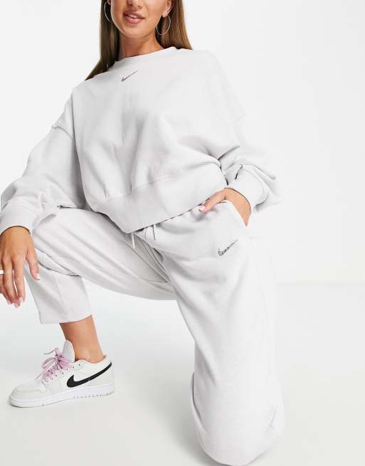 Nike Lounge essential fleece pants in grey marl