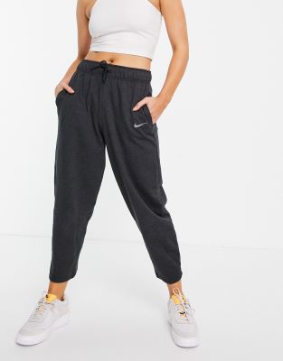 Nike - Lounge - Essentials - Fleece broek in gemêleerd zwart | ASOS