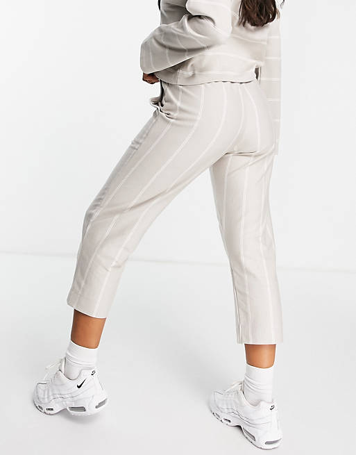 Women Nike Lounge wide leg pants in cream and white stripe 
