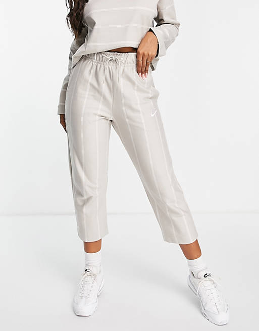 Women Nike Lounge wide leg pants in cream and white stripe 