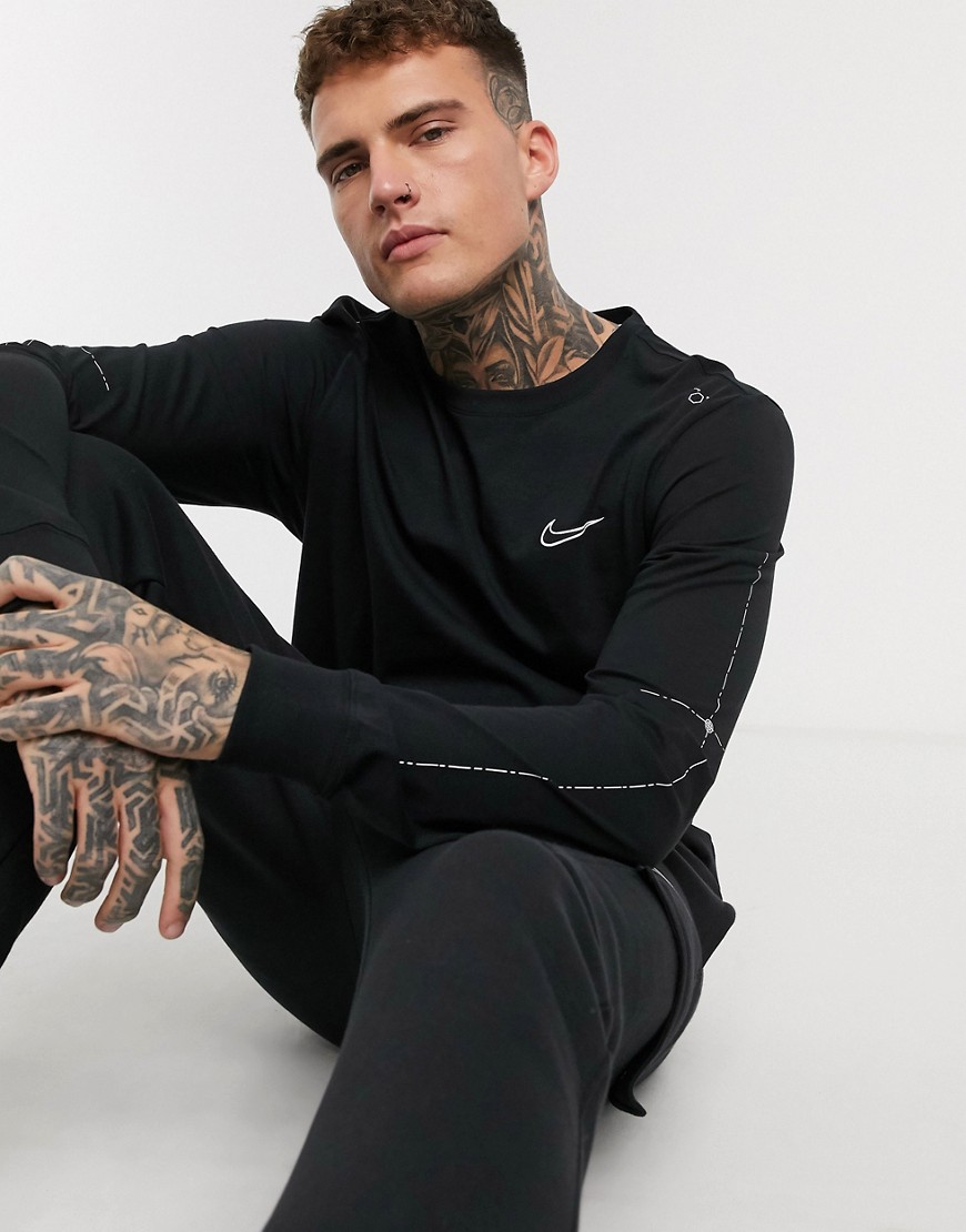 Nike - Maglietta a maniche lunghe nera con logo Nike grafico delineato-Nero