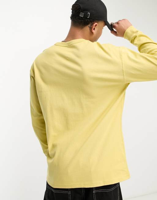 Nike Maglietta a maniche lunghe premium pesante color oro ASOS