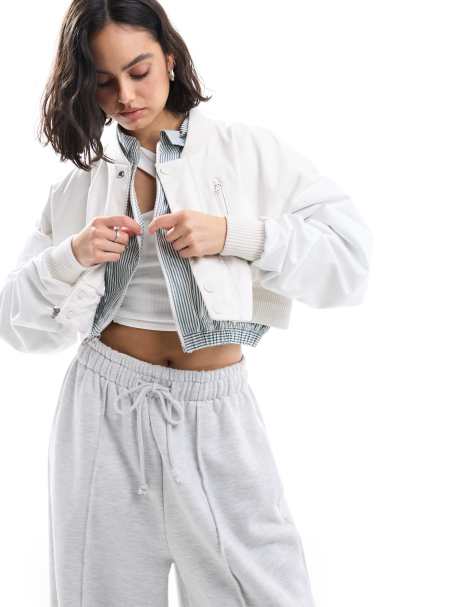 Nike MDC cropped woven bomber jacket in white - view 1