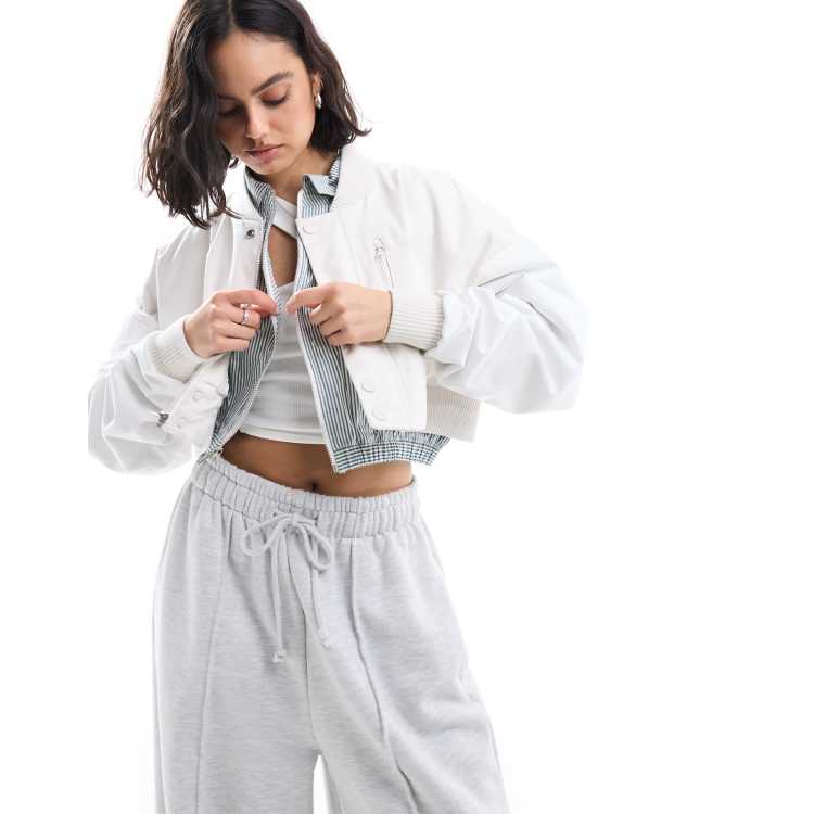 Nike MDC cropped woven bomber jacket in white | ASOS