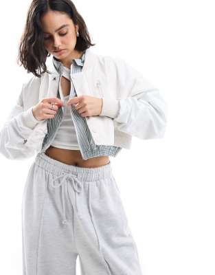 Nike Mdc Cropped Woven Bomber Jacket In White