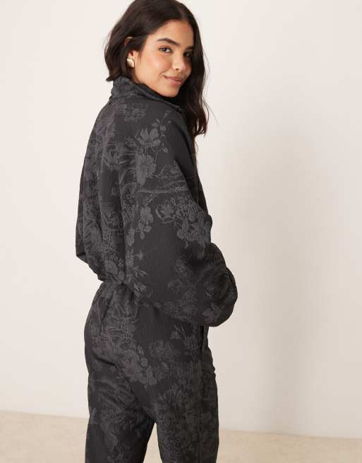 Nike MDC jaquard floral jacket in black and grey