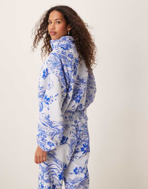 Nike MDC jaquard floral jacket in blue and white