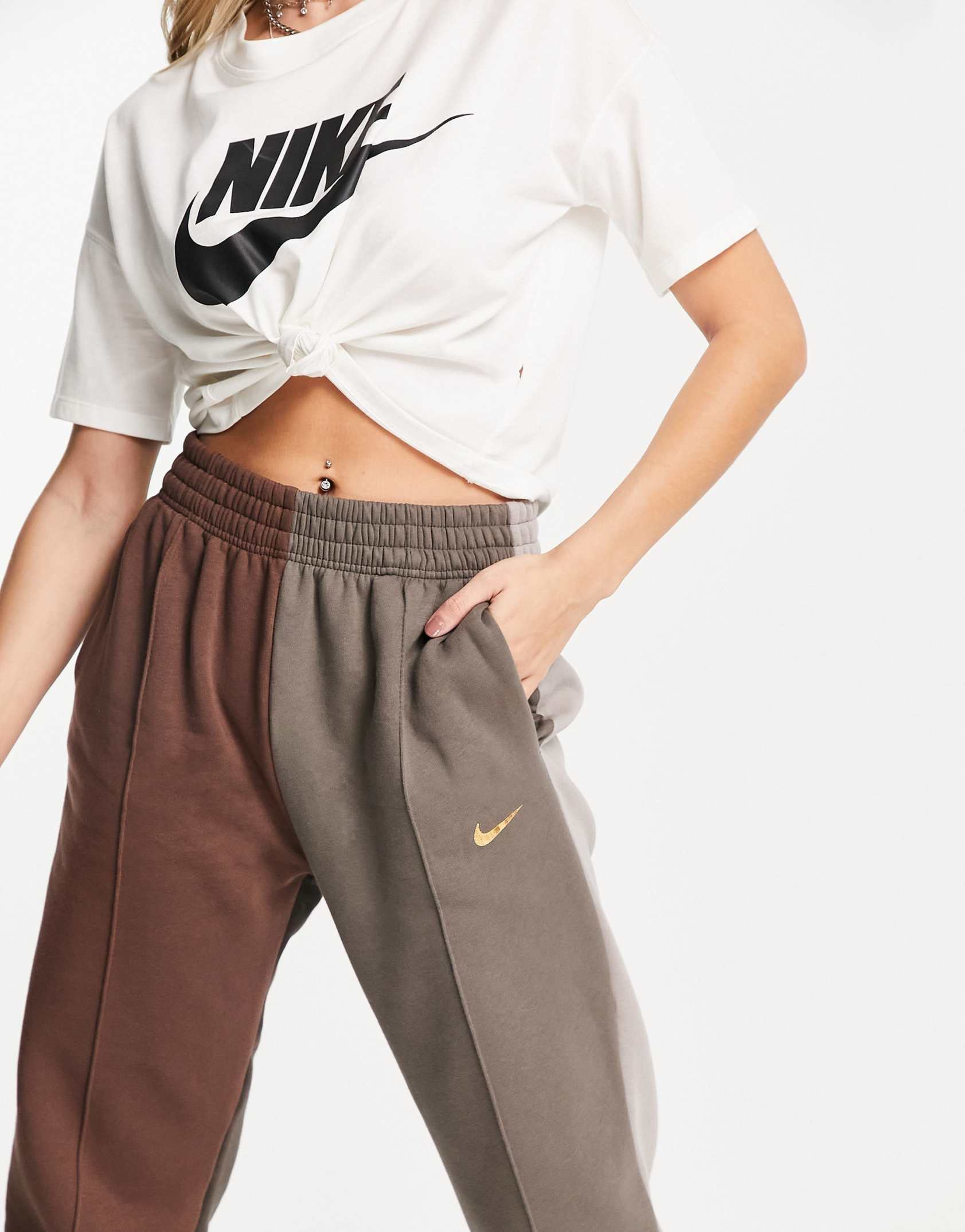 Nike Metallic Swoosh colour block joggers in brown and dark